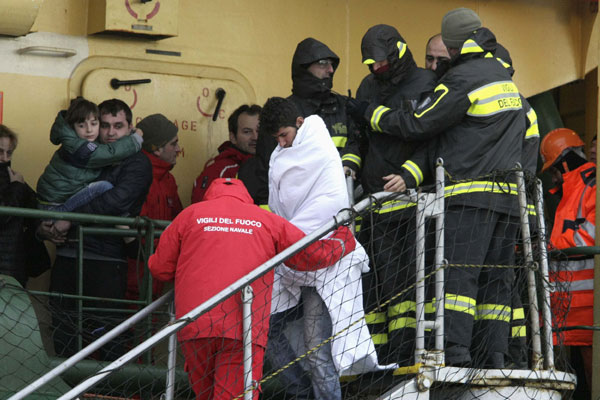 Rescued ferry passengers arrive in Italy