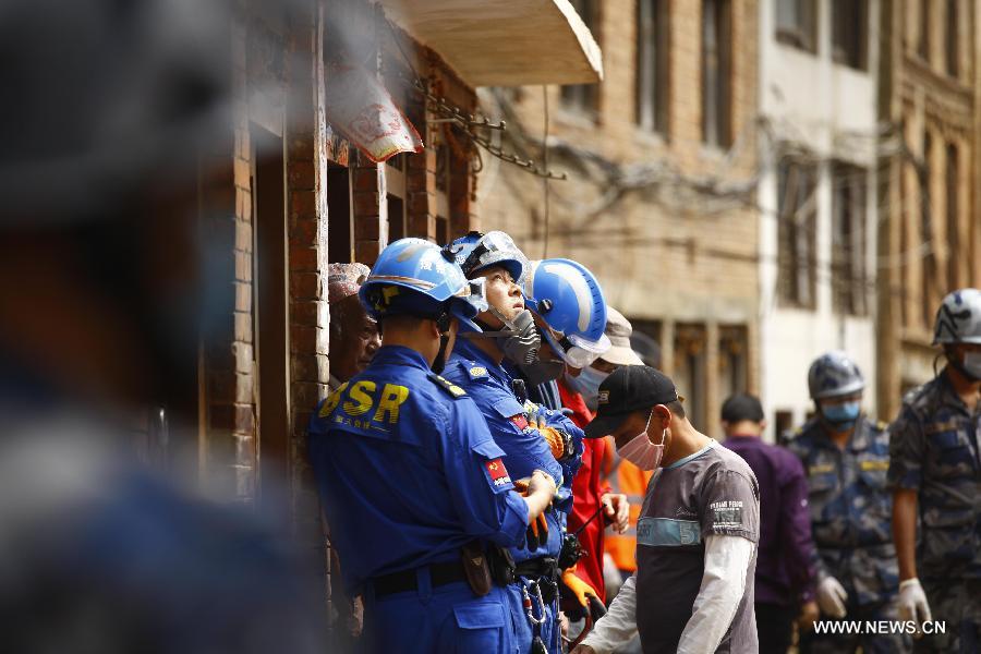 Chinese rescuers work on outskirts of Kathmandu, Nepal