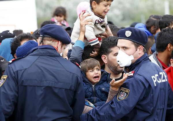 Border-free Europe unravels as migrant crisis hits record day