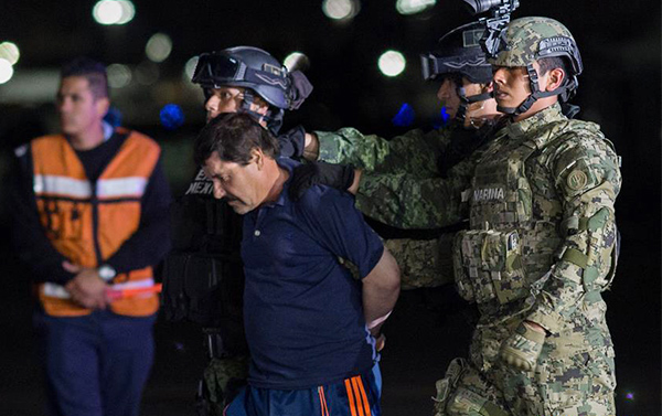 Drug lord Guzman faces extradition to US after lapses lead to capture