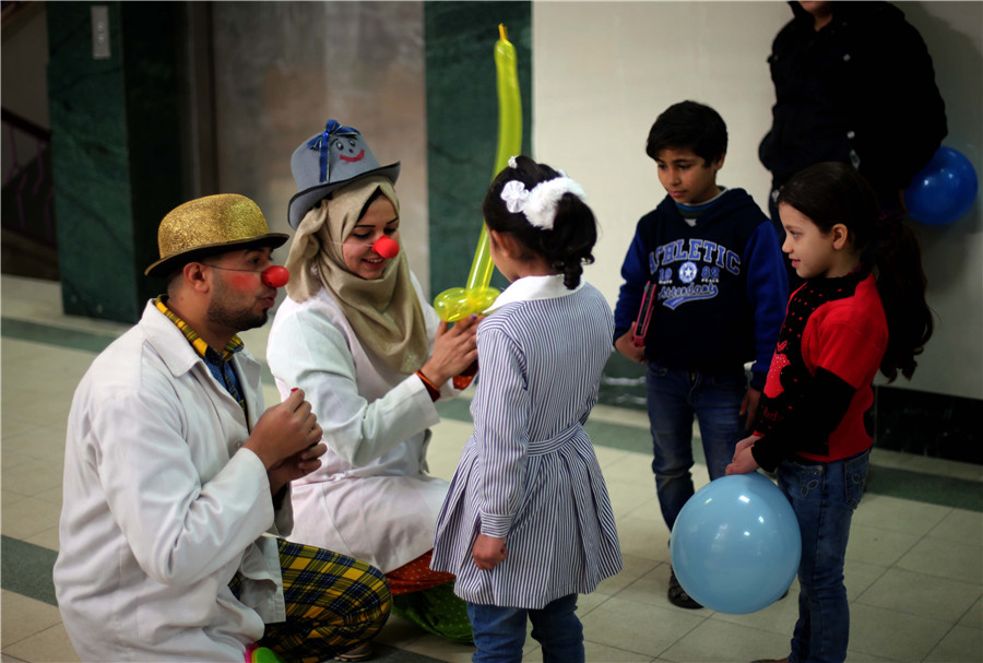 Clowns perform for children in Gaza hospital