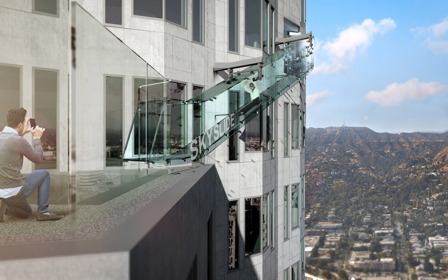 Woman rides skyslide 1000-feet above downtown Los Angeles