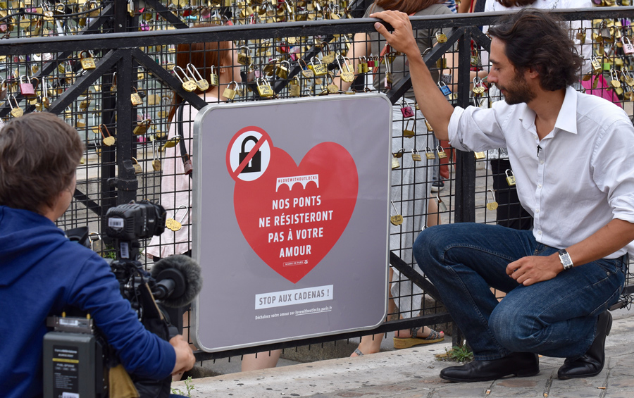 Locking lips is fine, but no locking locks, says Paris