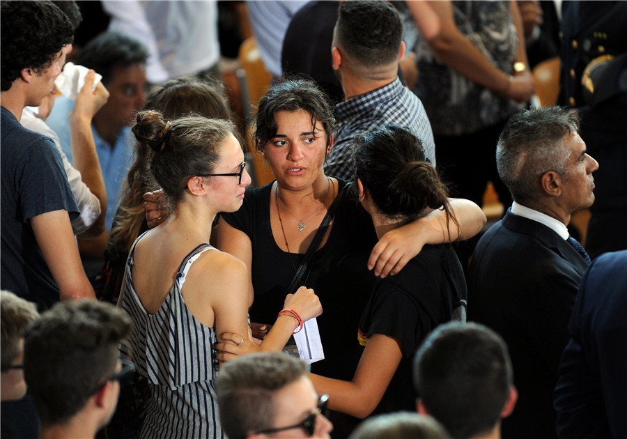 Relatives mourn for earthquake victims in Italy