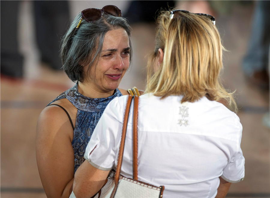 Relatives mourn for earthquake victims in Italy