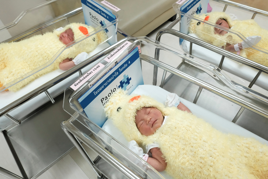 Newborn babies in Bangkok ring in CNY with chicken costumes