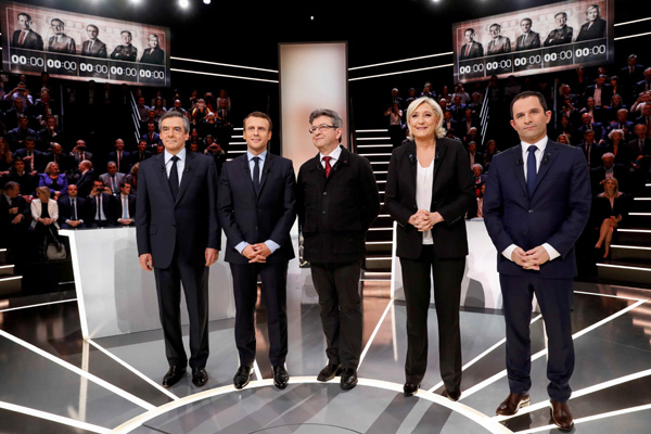 Macron, Le Pen clash in first French election TV debate