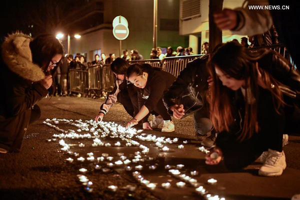 Chinese community holds protest in Paris against death of one Chinese national