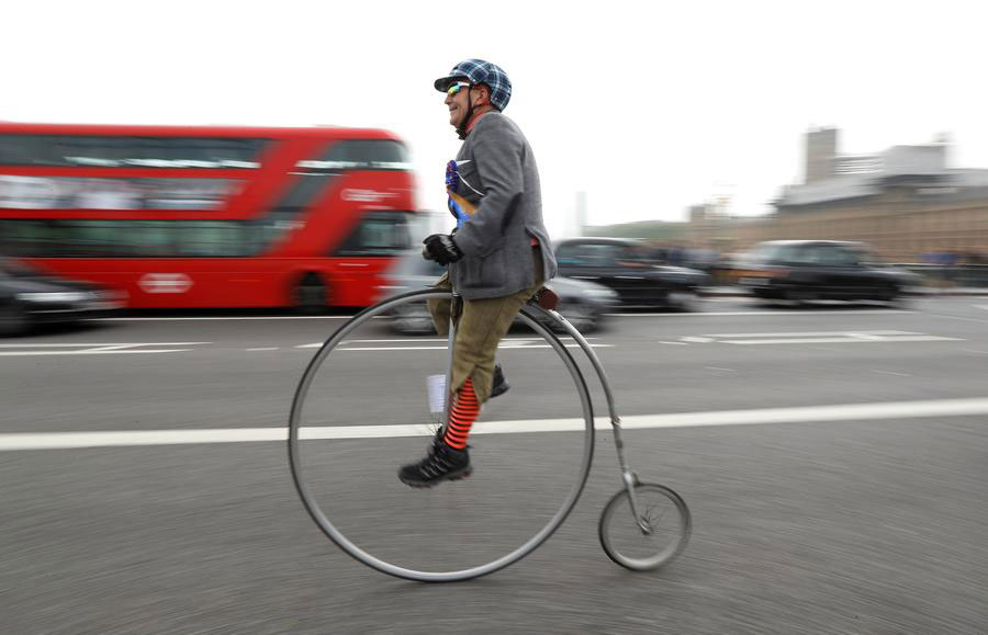 Hundreds of cyclists ride through The Tweed Run in London