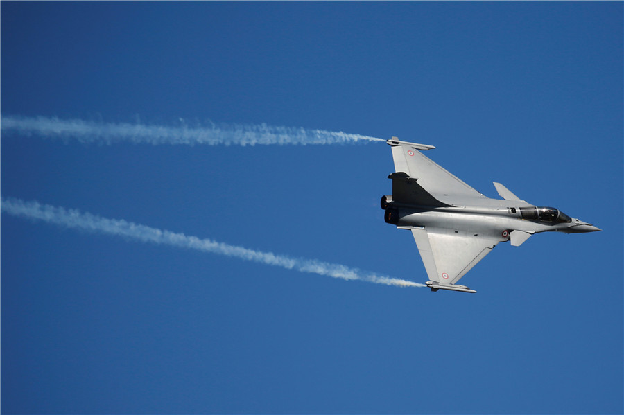 Macron opens Paris Air Show, promotes defense aeronautic business