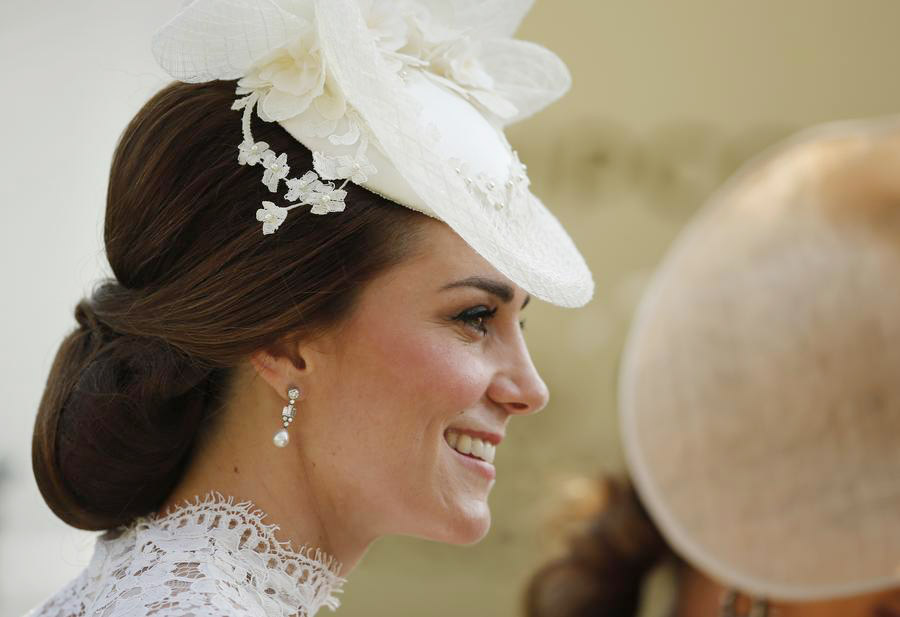 Despite high temps, Royal Ascot-goers don finest outfits