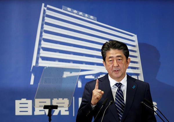 Abe's ruling bloc wins big in election