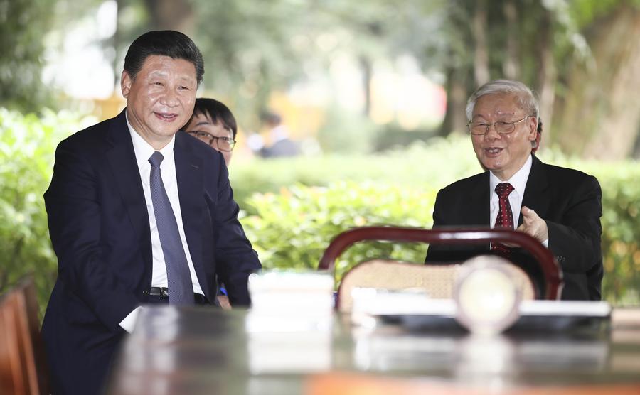 Xi visits Ho Chi Minh stilt house in Hanoi